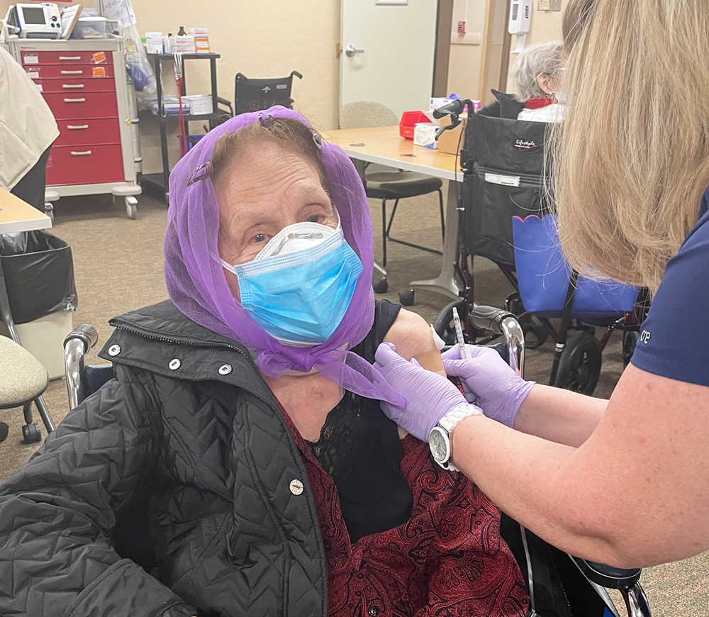 Dora Lopez receives vaccine