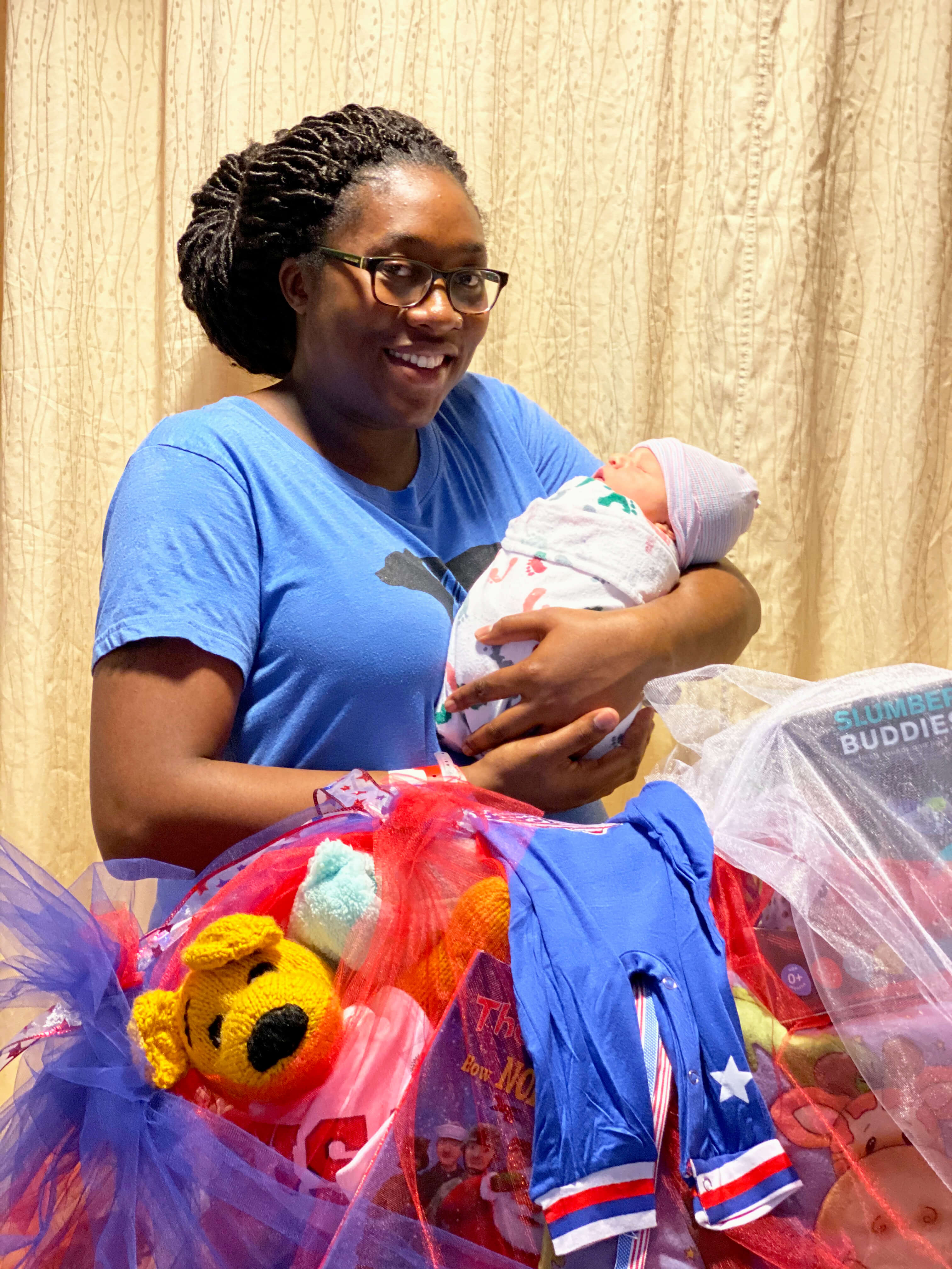 Latasha holding baby Kaysen