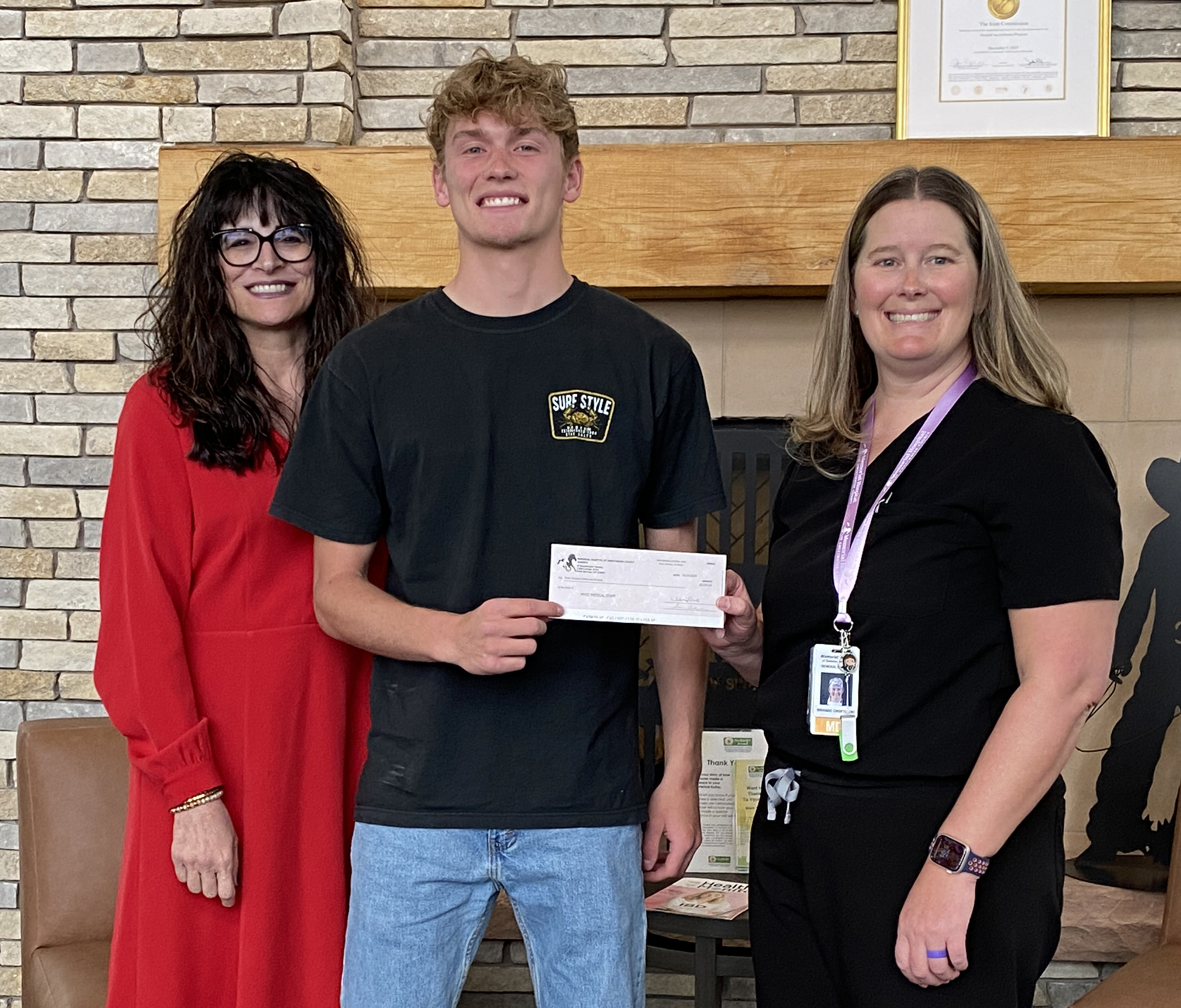 Chris Wilson receives scholarship award.
