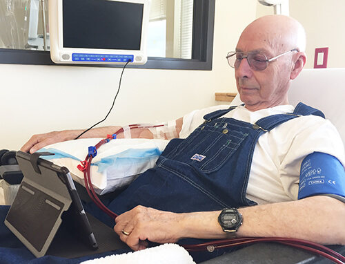 man receiving dialysis